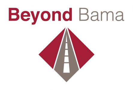 Open road pointing towards a Beyond Bama sign